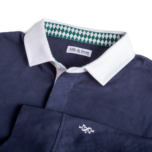 Navy blue shirt with white collar and green checkered interior on a white background